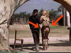 Poor Drew! However will she defend herself against the villain's vile advances? Whatever will she do?