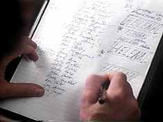 In a brilliant bit of directorial japery, Nick draws borders around Helena’s name. He’s ‘boxing’ ‘Helena.’ Get it?!!