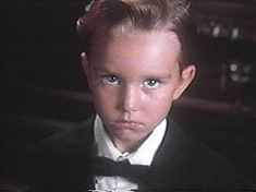 It’s bad enough that they stuck some poor little kid into this flick...