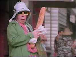 Director Nancy Walker makes a ‘Hitchcockian’ cameo as "Woman who Whacks Tammy Grimes in the Ass with a French Bread."