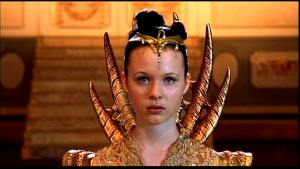 Empress Savina, looking like a cross between a lanternfish and a GWAR groupie.