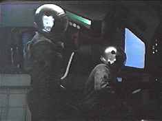 It’s hard to see here, but these suits don’t really match the still to the left.