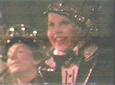 Uncredited cameo appearances by Barry Manilow (left) ...