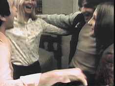 In the theoretically beautiful, but actually repulsive ending, our merry four leads engage in a group hug. Zoom.