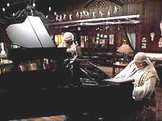 A rather literal interpretation of the phrase, "Accompanying me on the piano..."