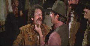 "Mister, if you tell one more supposedly wacky story about your 'Uncle Herman,' I swear I'll blow your head off!"