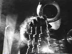 The Great unleashes his ultimate weapon, indicated by those scratches on the film negative.