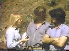 Judy Robinson explains the fine art of self-defense with a canteen to Gomer and Dylan